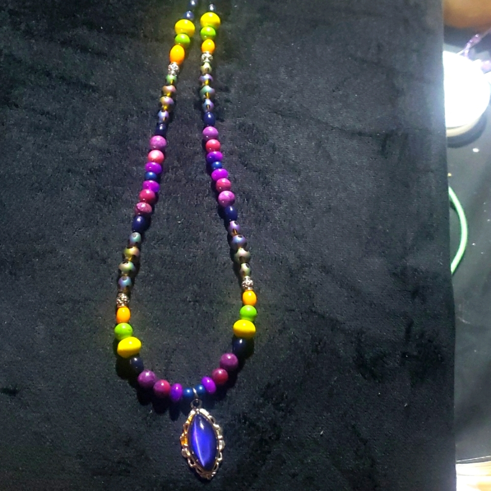 Mood changing pendent on semi precious store necklace